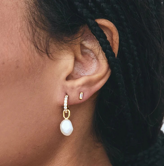 ada studs in gold