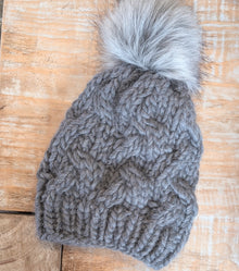  the luxe knit hat in steel with faux pom