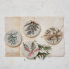 debossed stoneware holiday coasters